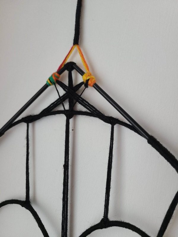 détail attache crane attrape-rêve rock